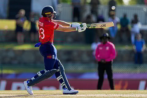 Jos Buttler plays a shot against Oman